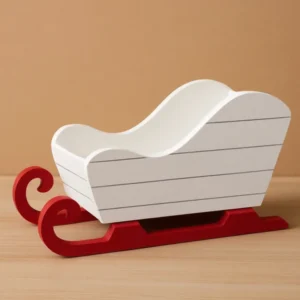 White and red wooden Christmas sleigh.