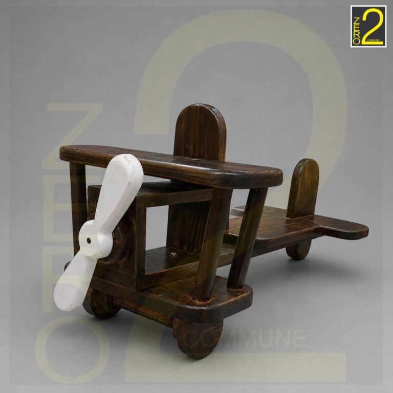 A classic brown vintage wooden aeroplane prop designed for newborn and baby photography shoots.