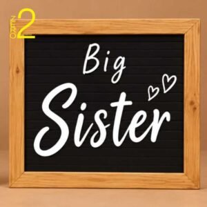 Big Sister maternity photography prop with black letter board, white lettering, heart details, and wood-look frame.