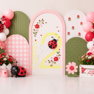 Baby girl ladybug theme photography backdrop with pink and green arches, flowers, balloons and cute ladybug decorations