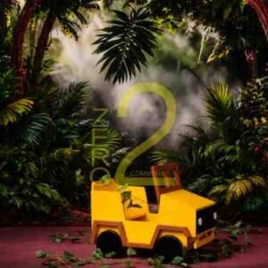 Jungle theme baby photography backdrop with tropical greenery, forest mist and yellow car setup