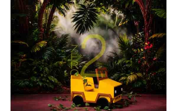 Jungle theme baby photography backdrop with tropical greenery, forest mist and yellow car setup